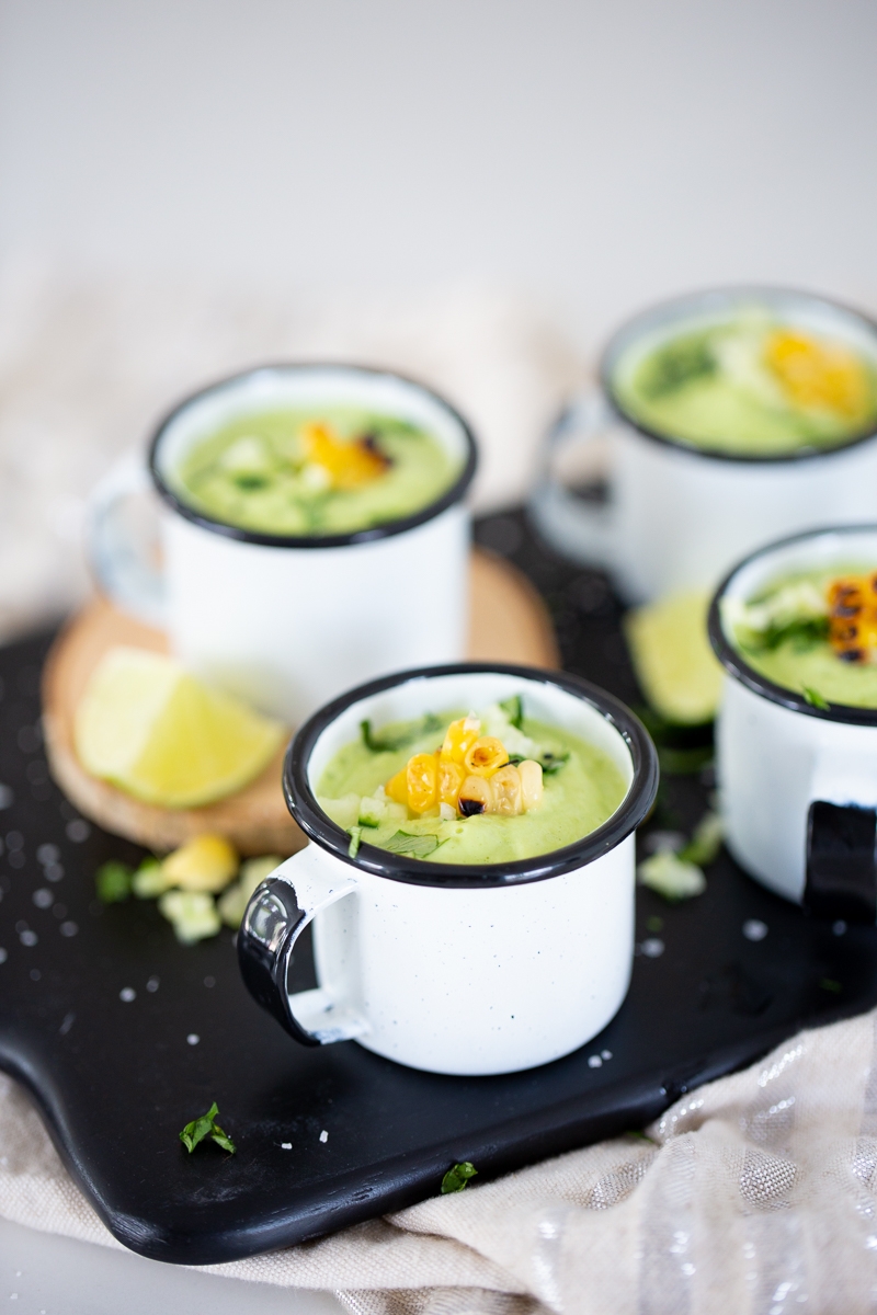 cold cucumber avocado soup served in small white cups