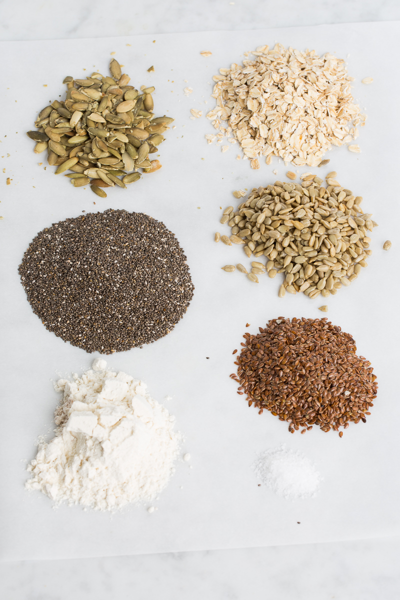 Ingredients of chia seed crackers. Bunch of seeds, flur and salt.