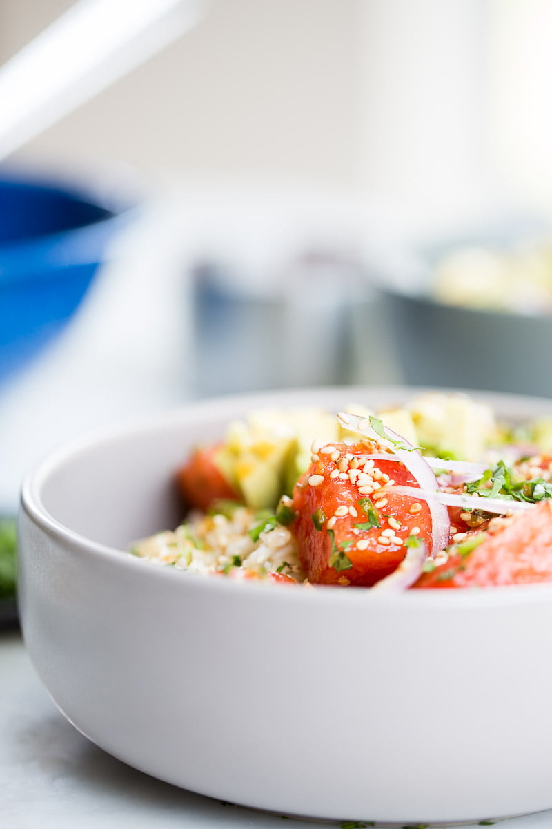 Vegan poke bowl. This poke bowl is made with rice, avocado, and watermelon.