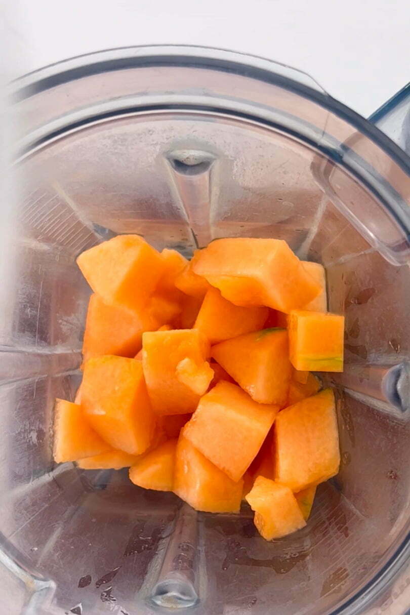 cubes cantaloupe in the blender container
