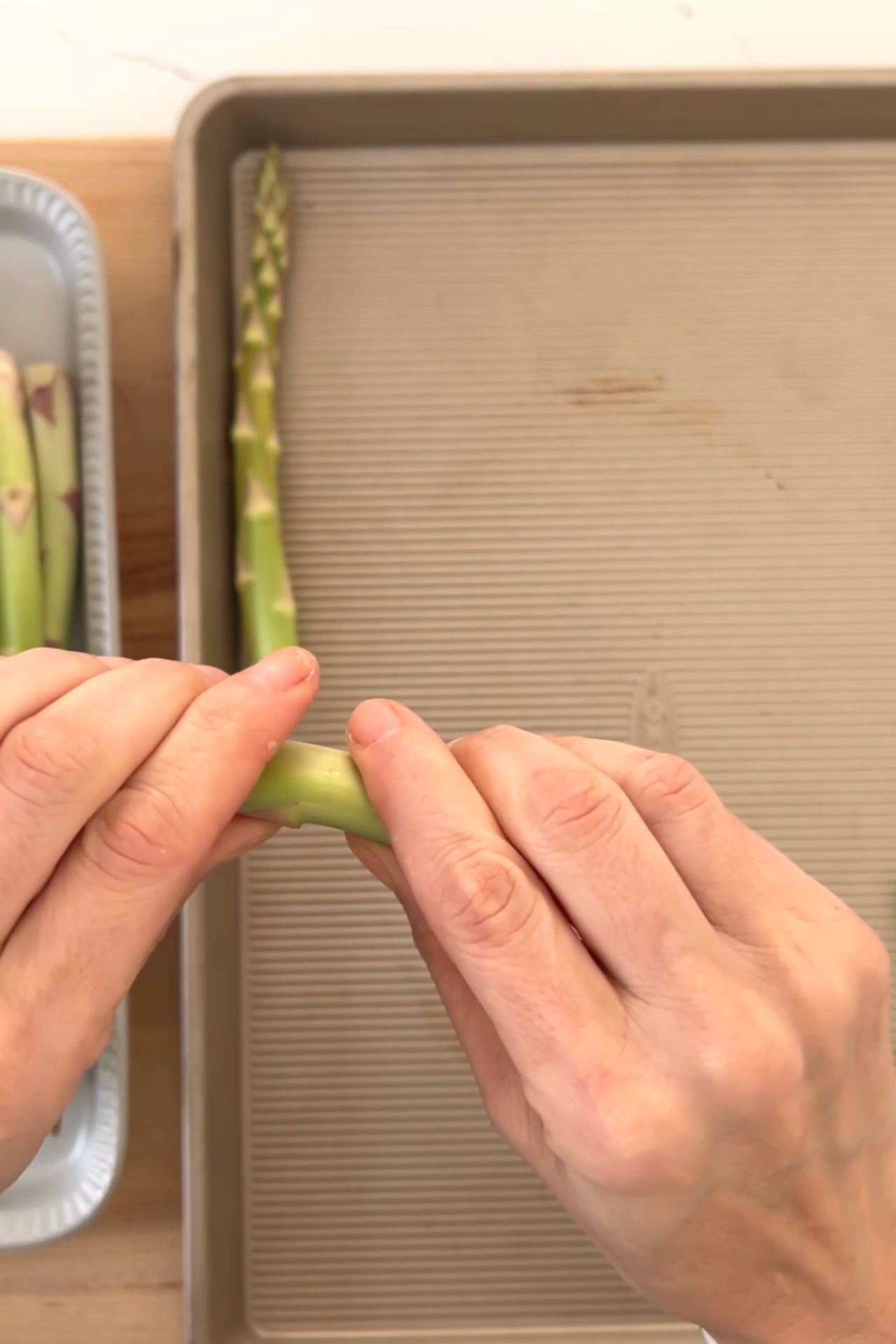 cotating the bottom of an asparagus spear