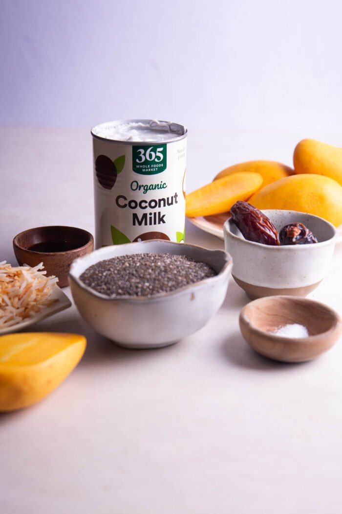 can of cconut milk, chia seeds, dates, mangoes and toasted shreded coconut to make chia seed pudding