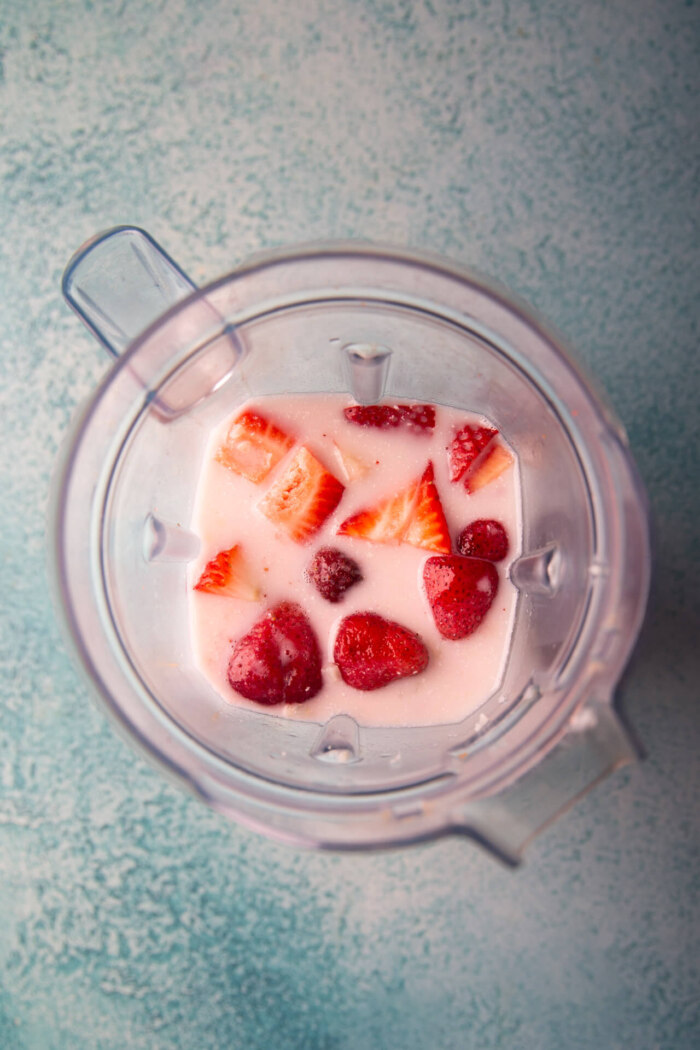 strawberries and milk in the blender