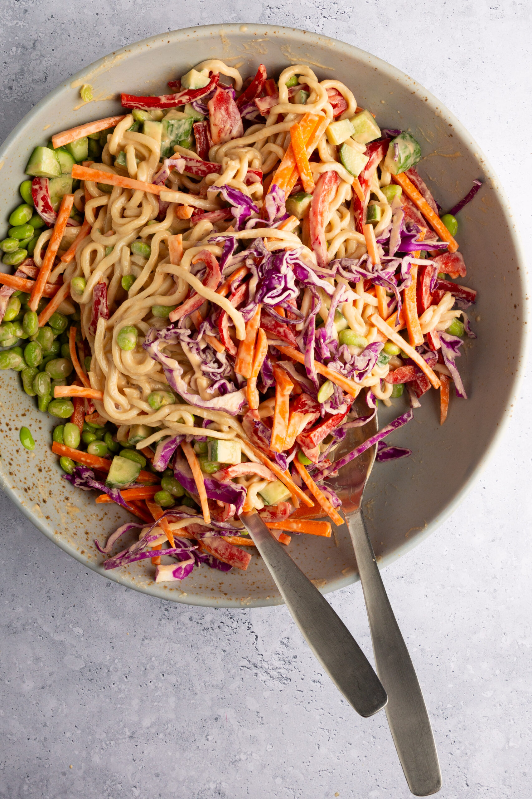 Vegan Asian Noodle Salad is just the ticket. With fresh, crunchy vegetables and a spicy cashew dressing