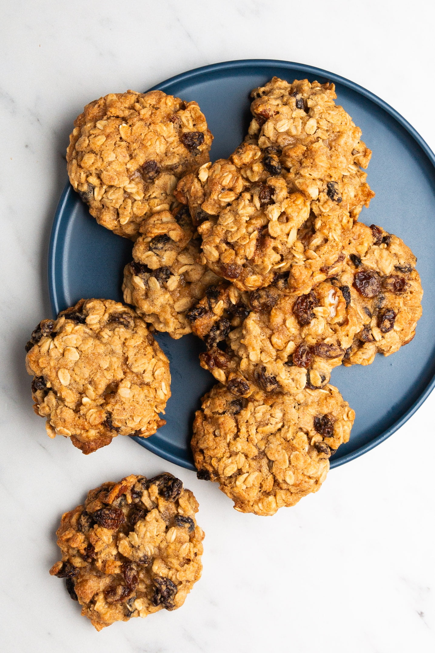 Delicious oatmeal cookies on a blue plate.
