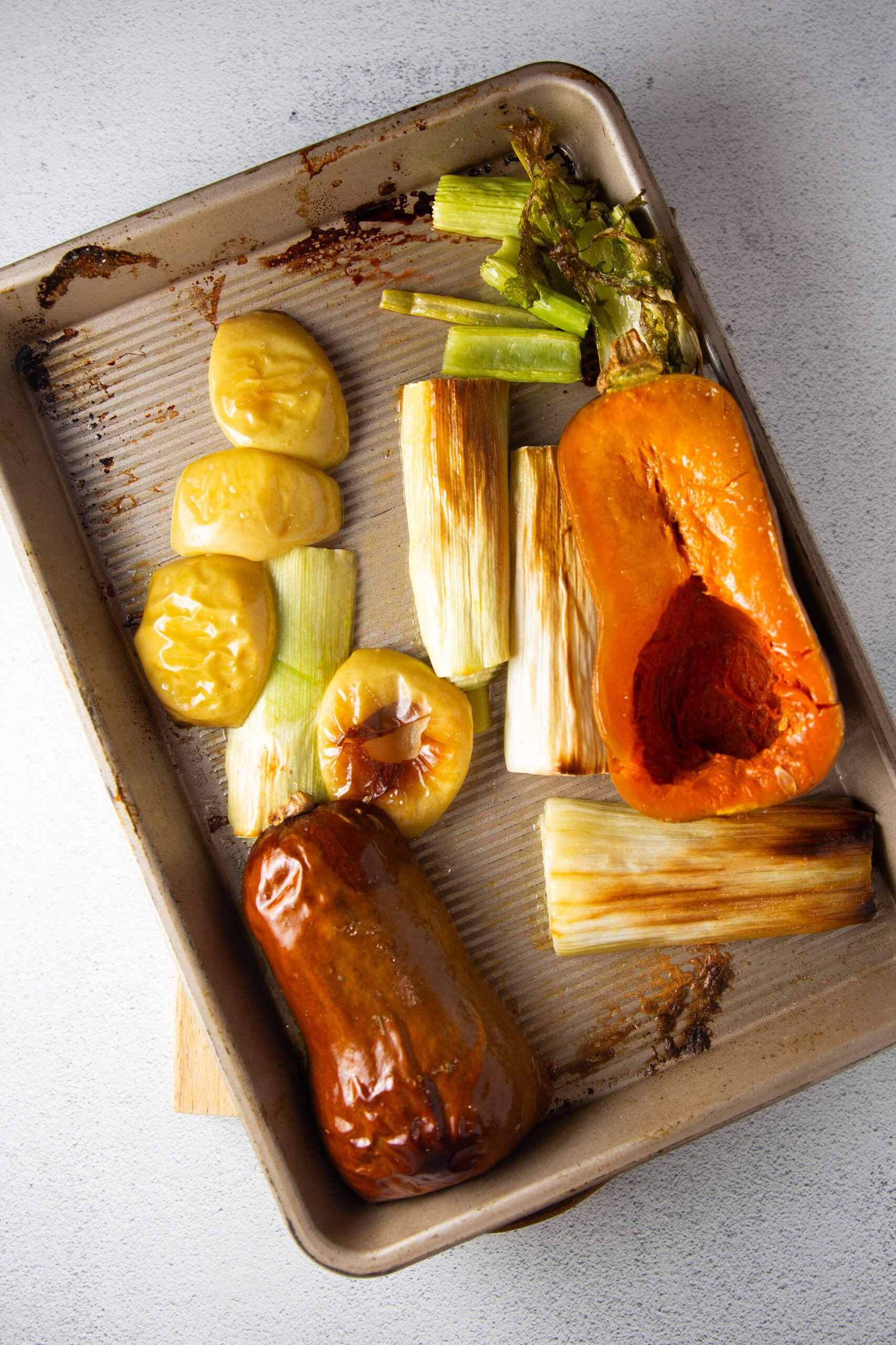 Recipe for roasted vegetables on a baking sheet.