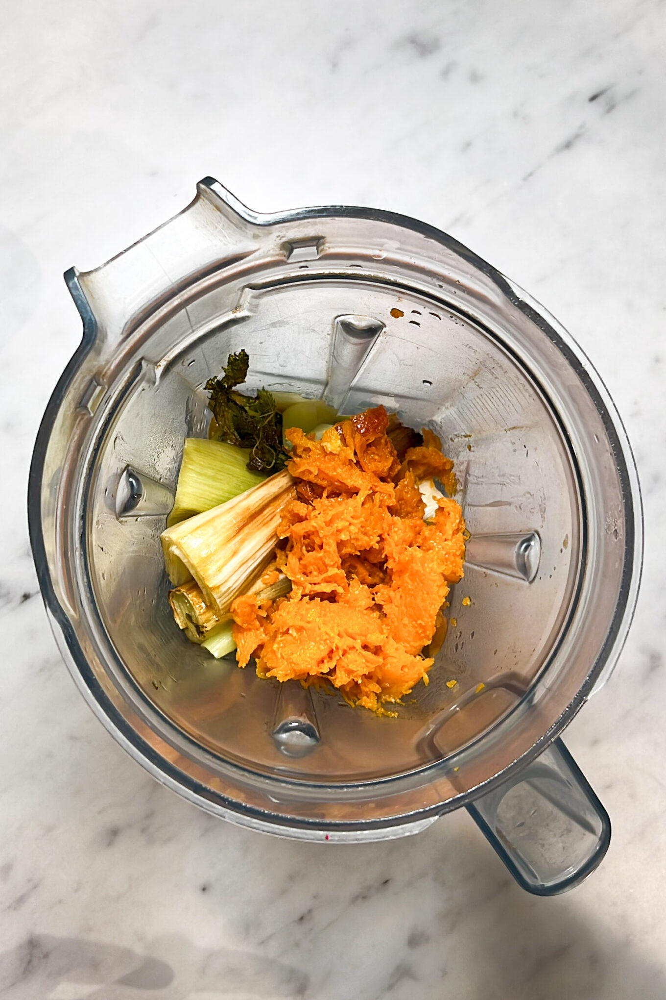 An easy and healthy blender filled with carrots, celery, and butternut squash soup recipe.