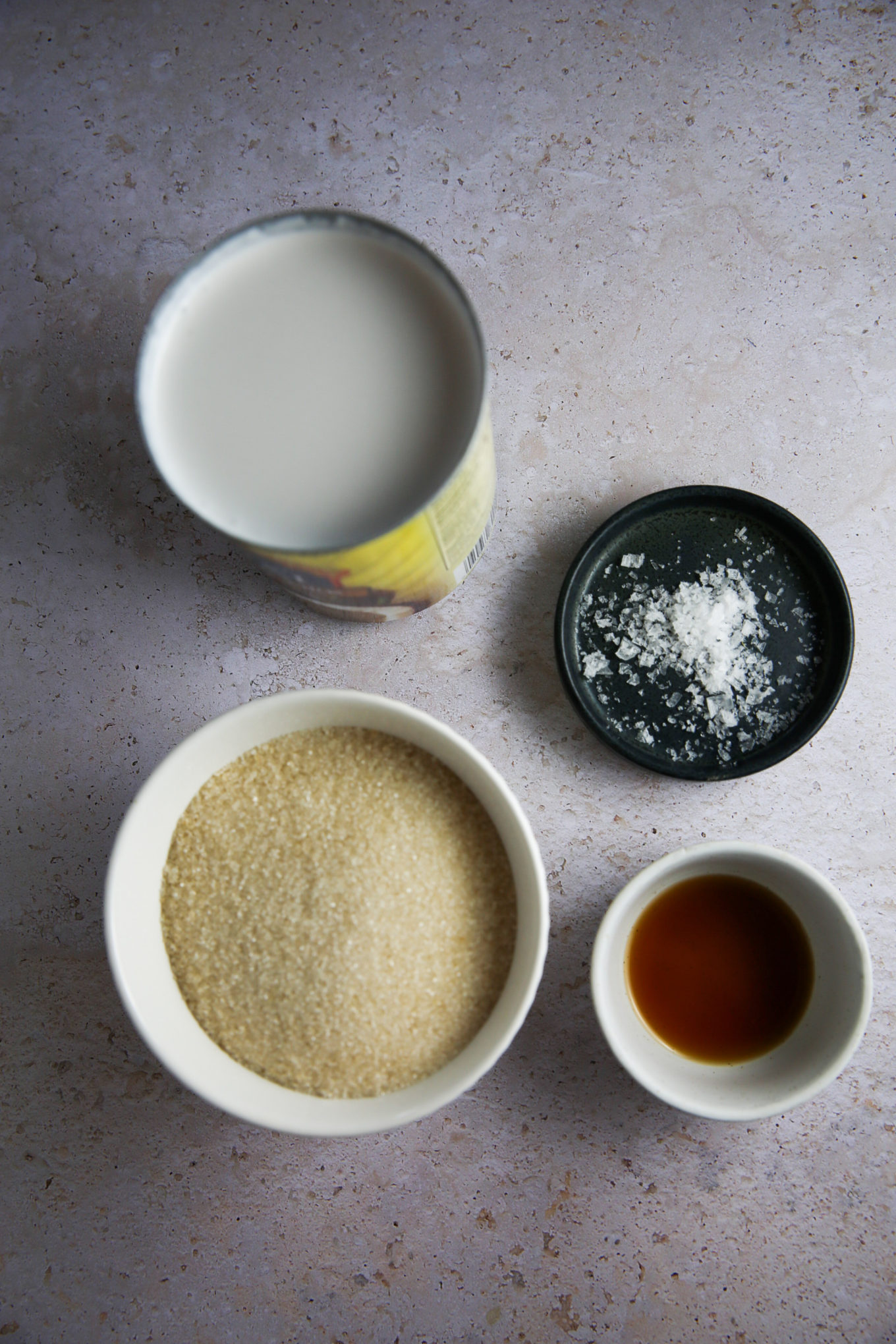 can of coconut milk, sugar and salt in small dishes